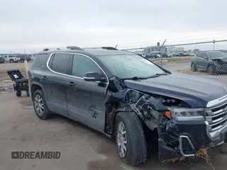 2021 GMC Acadia SLT z VIN 1GKKNULS4MZ147457, wystawiony jako IAAI lot #41521446 z przebiegiem 102 671 mil mil oraz . Historia ofert i sprzedaży dostępna na DreamBid. Obrazek 1.