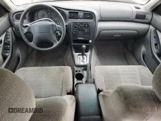 2002 Subaru Legacy L with VIN 4S3BE635727213302, listed as a Copart auction lot 58575235 with 243,886 mi miles and Salvage title. Bid and sale history available at DreamBid. Image 8.