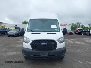 2022 Ford Transit Cargo with VIN 1FTBR3U85NKA64272, listed as a IAAI auction lot 42427708 with 62,043 mi miles and . Bid and sale history available at DreamBid. Image 13.