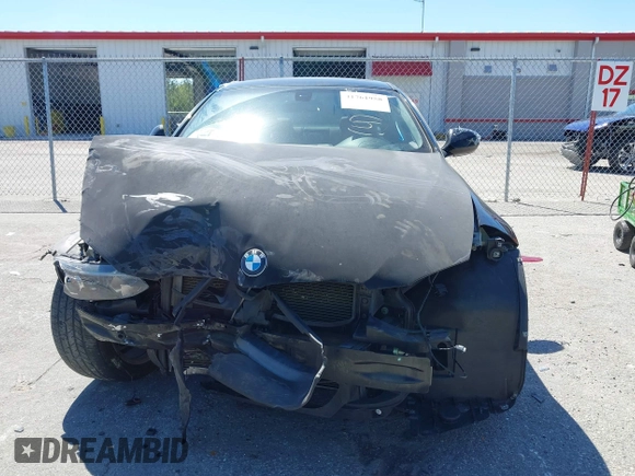 2010 BMW 3 Series 328i with VIN WBAWV1C58AP124385, listed as a IAAI auction lot 41761958 with 197,944 mi miles. Bid and sale history available at carsss.com. Image 13.