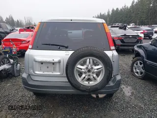 1999 Honda CR-V EX with VIN JHLRD1866XC033865, listed as a IAAI auction lot 41219896 with 142,396 mi miles. Bid and sale history available at carsss.com. Image 16.