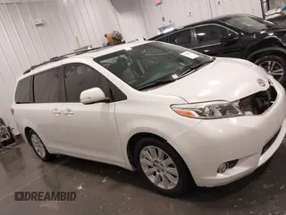 2015 Toyota Sienna XLE with VIN 5TDYK3DC3FS532593, listed as a IAAI auction lot 42126016 with 80,843 mi miles and . Bid and sale history available at DreamBid. Image 14.