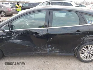 2018 Ford Focus Titanium с VIN 1FADP3N24JL252493, выставлен на аукционе IAAI как лот 41810980 с пробегом 119 998 миль миль и . История ставок и продаж доступна на DreamBid. Изображение 14.
