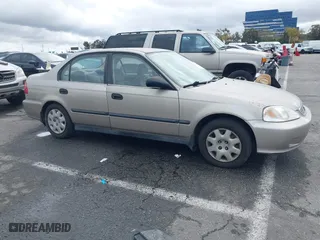 2000 Honda Civic DX with VIN 1HGEJ6625YL058339, listed as a IAAI auction lot 41521835 with 120,282 mi miles. Bid and sale history available at carsss.com. Image 13.