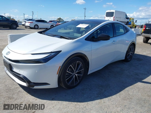 2023 Toyota Prius LE with VIN JTDACAAUXP3012538, listed as a IAAI auction lot 41948103 with 33,338 mi miles and . Bid and sale history available at DreamBid. Image 17.