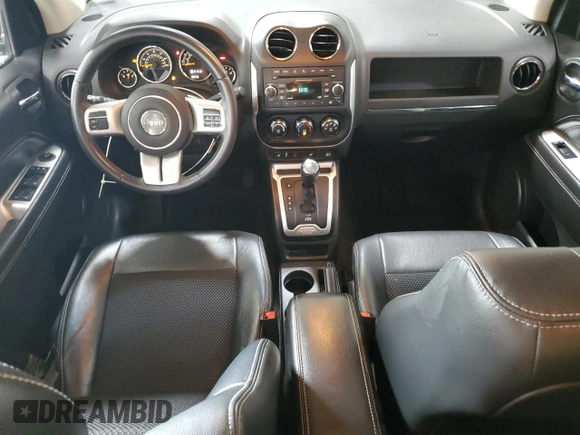 2016 Jeep Compass Latitude with VIN 1C4NJDEB2GD573909, listed as a Copart auction lot 62168225 with 70,944 mi miles and Salvage title. Bid and sale history available at DreamBid. Image 8.