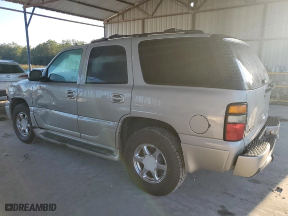 2006 GMC Yukon Denali with VIN 1GKEK63U16J161398, listed as a Copart auction lot 74919984 with 171,796 mi miles and Salvage Title. Bid and sale history available at carsss.com. Image 2.