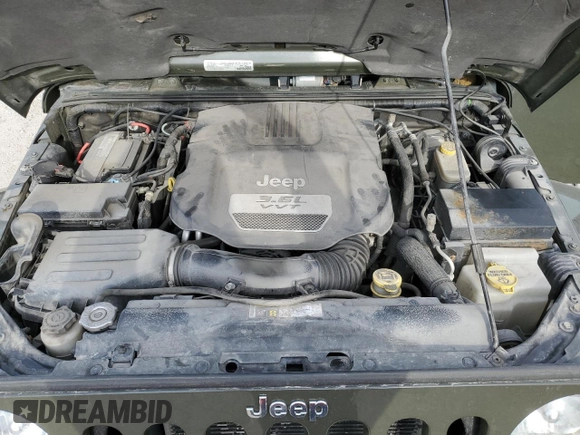 2015 Jeep Wrangler Unlimited Wrangler X with VIN 1C4BJWEG4FL769347, listed as a Copart auction lot 46394805 with 151,011 mi miles and Salvage title. Bid and sale history available at DreamBid. Image 12.