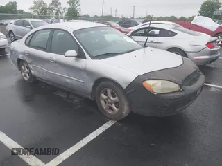 2001 Ford Taurus SES z VIN 1FAFP55U91G196212, wystawiony jako IAAI lot #42210664 z przebiegiem 400 858 mil mil oraz . Historia ofert i sprzedaży dostępna na DreamBid. Obrazek 1.