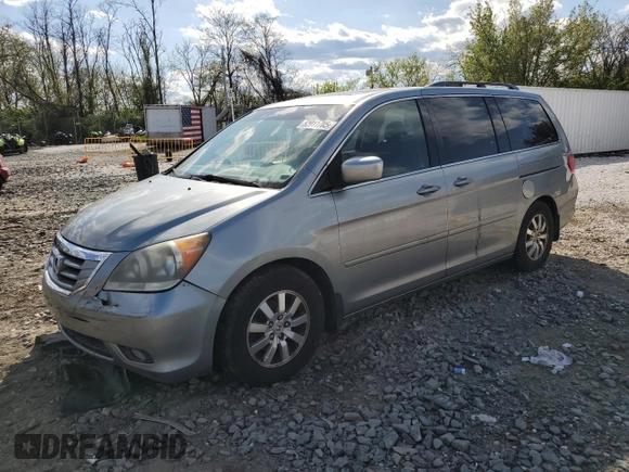 2010 Honda Odyssey EX-L with VIN 5FNRL3H78AB030903, listed as a Copart auction lot 52911705 with 200,499 mi miles and Salvage Title. Bid and sale history available at carsss.com. Image 1.