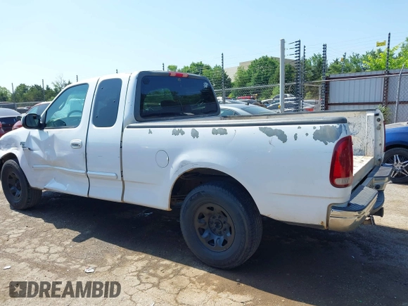 2001 Ford F-150 z VIN 1FTPX17LX1KB15016, wystawiony jako IAAI lot #42320637 z przebiegiem 567 424 mil mil oraz . Historia ofert i sprzedaży dostępna na DreamBid. Obrazek 15.