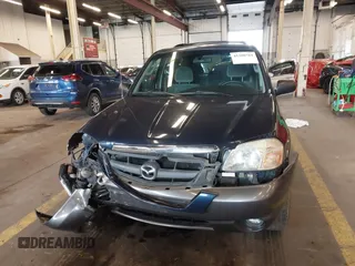 2003 Mazda Tribute LX with VIN 4F2YZ94193KM56345, listed as a IAAI auction lot 41200769 with 141,728 mi miles and . Bid and sale history available at DreamBid. Image 12.