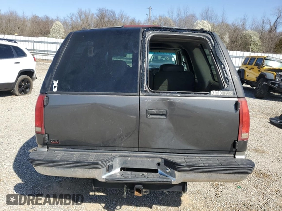 1999 GMC Yukon with VIN 1GKEC13R9XJ805842, listed as a Copart auction lot 48952625 with 259,149 mi miles and Clean Title. Bid and sale history available at carsss.com. Image 6.
