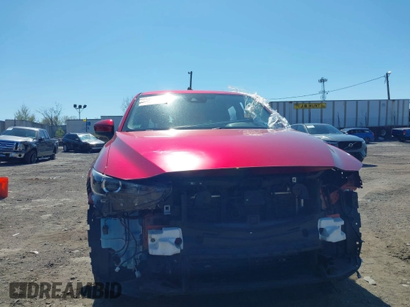 2019 Mazda CX-5 Sport with VIN JM3KFBBM6K1596402, listed as a IAAI auction lot 41971766 with 60,396 mi miles and . Bid and sale history available at DreamBid. Image 13.