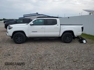 2023 Toyota Tacoma SR with VIN 3TMCZ5AN2PM642205, listed as a Copart auction lot 61045955 with 10,596 mi miles and Salvage title. Bid and sale history available at DreamBid. Image 12.