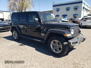 2020 Jeep Wrangler Unlimited Sahara with VIN 1C4HJXEGXLW209908, listed as a Copart auction lot 49409625 with 73,352 mi miles and Salvage title. Bid and sale history available at DreamBid. Image 4.
