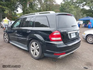 2011 Mercedes-Benz GL-Class GL 450 with VIN 4JGBF7BE6BA635581, listed as a IAAI auction lot 40401205 with 112,344 mi miles. Bid and sale history available at carsss.com. Image 3.