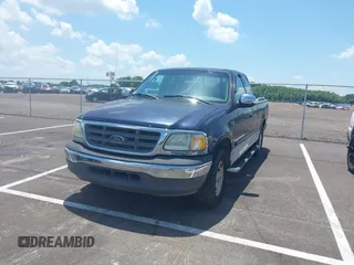 2002 Ford F-150 XL with VIN 2FTRX17282CA87285, listed as a IAAI auction lot 42766616 with 183,960 mi miles and . Bid and sale history available at DreamBid. Image 2.