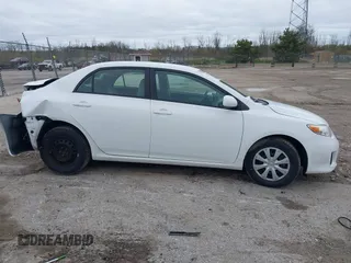 2011 Toyota Corolla L with VIN 2T1BU4EE5BC668913, listed as a IAAI auction lot 42181373 with 148,573 mi miles and . Bid and sale history available at DreamBid. Image 13.
