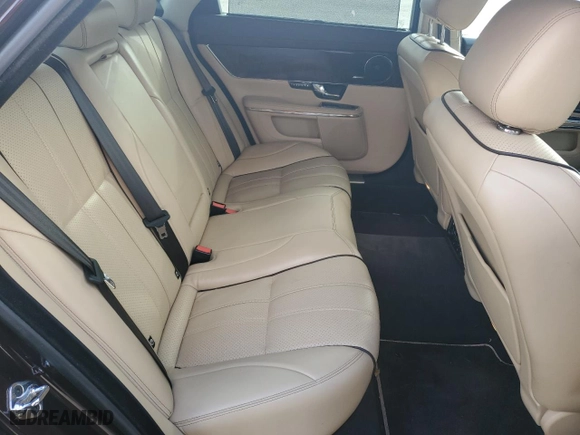 2013 Jaguar XJ with VIN SAJWA2G12DLV57581, listed as a Copart auction lot 84736054 with 91,779 mi miles and Salvage Title. Bid and sale history available at carsss.com. Image 10.