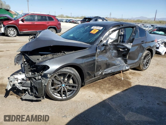 2020 BMW 5 Series 530e with VIN WBAJA9C02LCE53489, listed as a Copart auction lot 56739195 with Not provided miles and Salvage title. Bid and sale history available at DreamBid. Image 1.