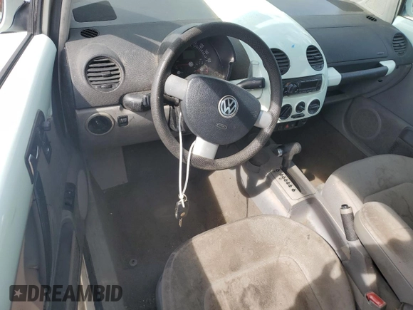 2001 Volkswagen Beetle GLS z VIN 3VWCD21C51M447957, wystawiony jako Copart lot #59517765 z przebiegiem 145 484 mil mil oraz Szkoda całkowita • Salvage title. Historia ofert i sprzedaży dostępna na DreamBid. Obrazek 8.