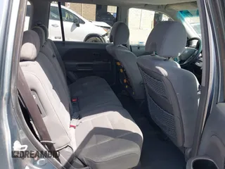 2007 Honda Pilot EX with VIN 2HKYF18447H520522, listed as a IAAI auction lot 42018937 with 128,401 mi miles. Bid and sale history available at carsss.com. Image 8.