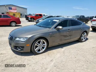 2012 Audi A7 Prestige с VIN WAUSGBFC8CN027680, выставлен на аукционе Copart как лот 64815205 с пробегом 116 333 миль миль и Списание • Salvage title. История ставок и продаж доступна на DreamBid. Изображение 1.
