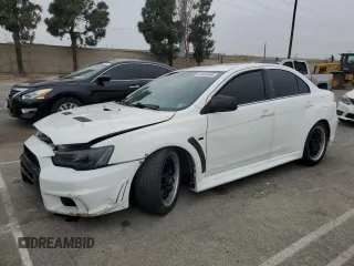 2015 Mitsubishi Lancer Evolution MR z VIN JA32W5FV5FU005248, wystawiony jako Copart lot #53923665 z przebiegiem 105 582 mil mil oraz Szkody całkowita. Historia ofert i sprzedaży dostępna na DreamBid. Obrazek 1.
