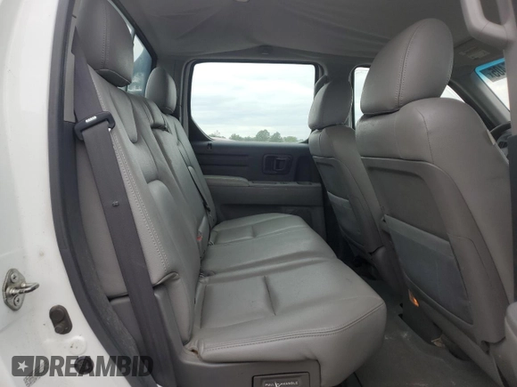 2011 Honda Ridgeline RT z VIN 5FPYK1F25BB001586, wystawiony jako Copart lot #65005405 z przebiegiem 184 046 mil mil oraz Czysty tytuł • Clean title. Historia ofert i sprzedaży dostępna na DreamBid. Obrazek 10.