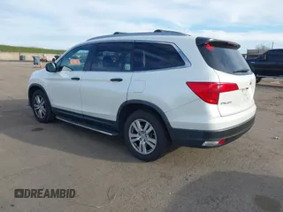 2016 Honda Pilot LX with VIN 5FNYF6H1XGB009768, listed as a IAAI auction lot 41666109 with 137,733 mi miles. Bid and sale history available at carsss.com. Image 3.