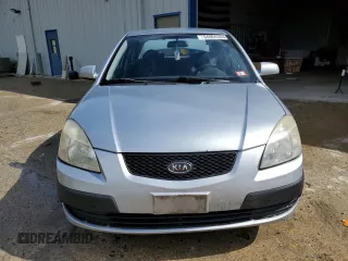 2009 Kia Rio LX with VIN KNADE223396548989, listed as a Copart auction lot 64964304 with 150,426 mi miles and Salvage Title. Bid and sale history available at carsss.com. Image 5.