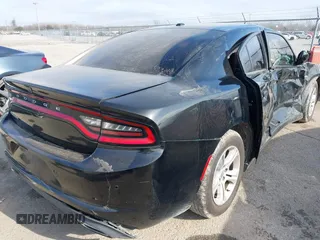 2019 Dodge Charger SXT with VIN 2C3CDXBG1KH709916, listed as a IAAI auction lot 41386840 with 151,403 mi miles and . Bid and sale history available at DreamBid. Image 4.