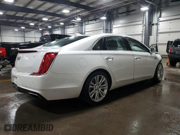 2018 Cadillac XTS Luxury with VIN 2G61N5S35J9122938, listed as a Copart auction lot 48697025 with 94,806 mi miles and Salvage title. Bid and sale history available at DreamBid. Image 3.