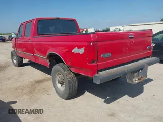 1997 Ford F-350 z VIN 1FTJW36G5VEC23170, wystawiony jako IAAI lot #42013727 z przebiegiem 318 411 mil mil oraz . Historia ofert i sprzedaży dostępna na DreamBid. Obrazek 3.