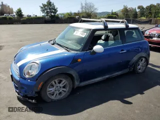 2012 MINI Hardtop with VIN WMWSU3C53CT257126, listed as a Copart auction lot 52146465 with 146,485 mi miles and Salvage Title. Bid and sale history available at DreamBid. Image 1.