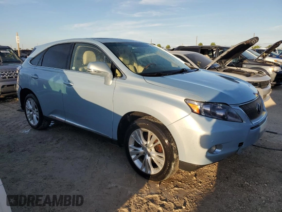 2012 Lexus RX 450h with VIN JTJZB1BA9C2006141, listed as a Copart auction lot 74452404 with Not provided miles and Salvage title. Bid and sale history available at DreamBid. Image 4.