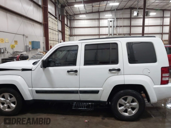 2012 Jeep Liberty Sport with VIN 1C4PJLAK2CW171461, listed as a IAAI auction lot 41896899 with 157,452 mi miles and . Bid and sale history available at carsss.com. Image 14.