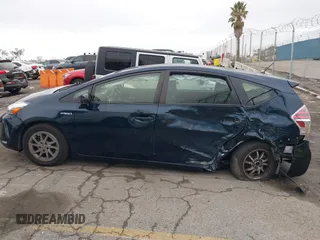2017 Toyota Prius v Two with VIN JTDZN3EU2HJ061734, listed as a IAAI auction lot 41517072 with 99,294 mi miles. Bid and sale history available at carsss.com. Image 14.