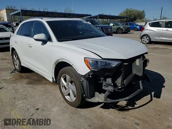 2020 Audi Q3 Premium with VIN WA1AECF30L1023652, listed as a Copart auction lot 57148915 with 69,621 mi miles and Salvage title. Bid and sale history available at DreamBid. Image 14.
