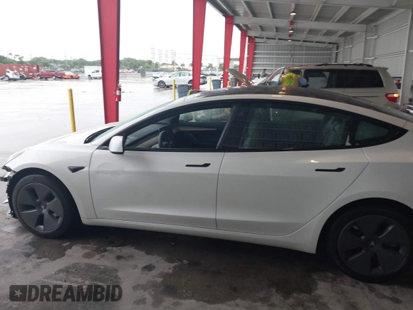 2023 Tesla Model 3 with VIN 5YJ3E1EA9PF548726, listed as a IAAI auction lot 42345157 with 30,647 mi miles and . Bid and sale history available at DreamBid. Image 15.