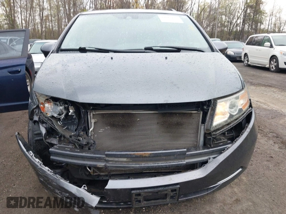 2014 Honda Odyssey EX-L with VIN 5FNRL5H63EB033684, listed as a IAAI auction lot 42025249 with 128,017 mi miles and . Bid and sale history available at carsss.com. Image 12.