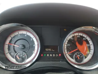 2014 Dodge Grand Caravan SXT with VIN 2C4RDGCG2ER263682, listed as a Copart auction lot 51060795 with 90,951 mi miles and Non Repairable. Bid and sale history available at DreamBid. Image 9.