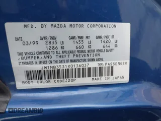 1999 Mazda MX-5 Miata with VIN JM1NB3531X0136037, listed as a IAAI auction lot 42196338 with Not provided miles and . Bid and sale history available at DreamBid. Image 9.