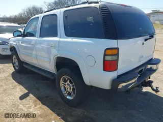 2001 Chevrolet Tahoe LS with VIN 1GNEK13T01R161951, listed as a IAAI auction lot 41762235 with 134,924 mi miles. Bid and sale history available at carsss.com. Image 3.