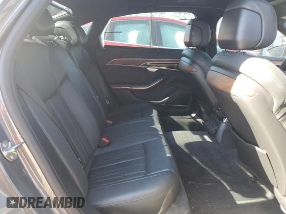 2019 Audi A8 z VIN WAU8DAF82KN007562, wystawiony jako Copart lot #42766345 z przebiegiem 92 532 mil mil oraz Szkoda całkowita • Salvage title. Historia ofert i sprzedaży dostępna na DreamBid. Obrazek 11.