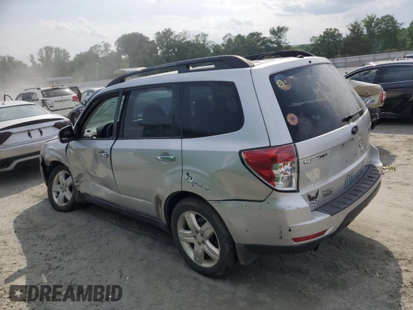 2009 Subaru Forester X Limited with VIN JF2SH64679H771672, listed as a Copart auction lot 59602445 with 148,429 mi miles and Salvage title. Bid and sale history available at DreamBid. Image 2.
