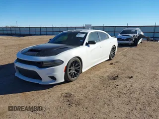 2021 Dodge Charger R/T with VIN 2C3CDXCT4MH588104, listed as a IAAI auction lot 41455312 with 72,162 mi miles and . Bid and sale history available at DreamBid. Image 2.