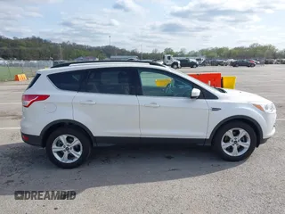 2016 Ford Escape SE with VIN 1FMCU0GX4GUC55365, listed as a IAAI auction lot 41901838 with 72,913 mi miles. Bid and sale history available at carsss.com. Image 13.