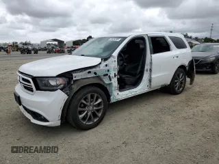 2015 Dodge Durango Limited with VIN 1C4RDHDG0FC695010, listed as a Copart auction lot 53826355 with 181,169 mi miles and Salvage title. Bid and sale history available at DreamBid. Image 1.